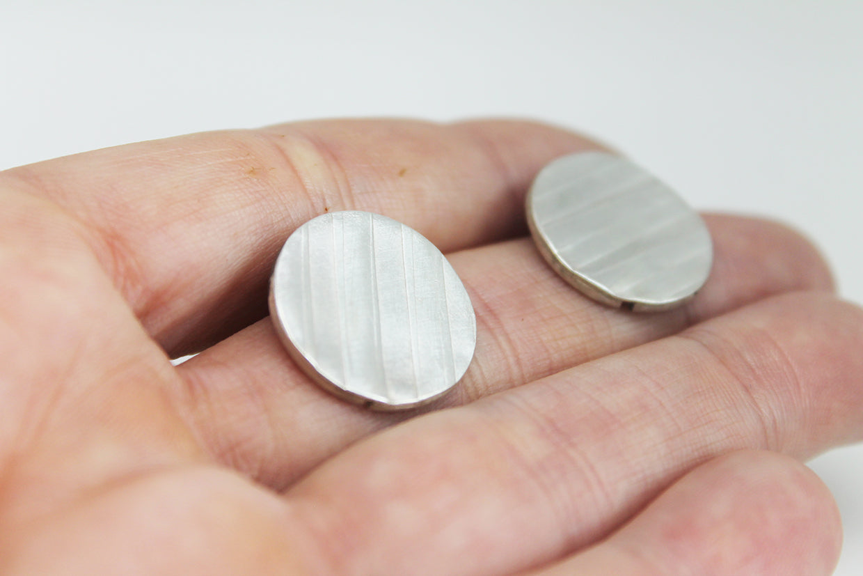 Round Silver Textured earrings