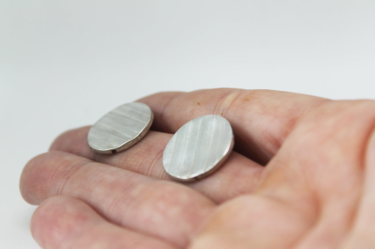 Round Silver Textured earrings