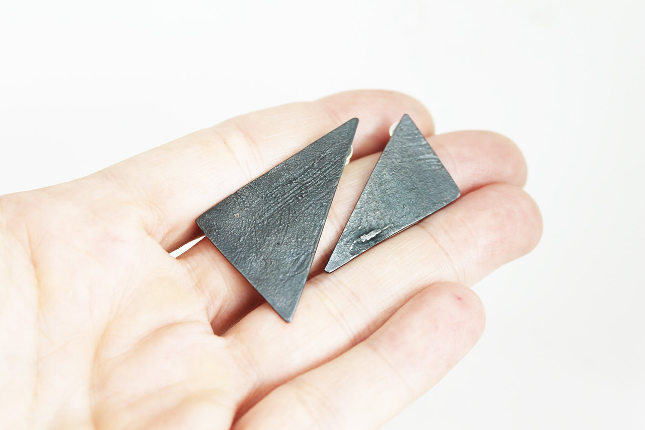 Black silver triangle earrings