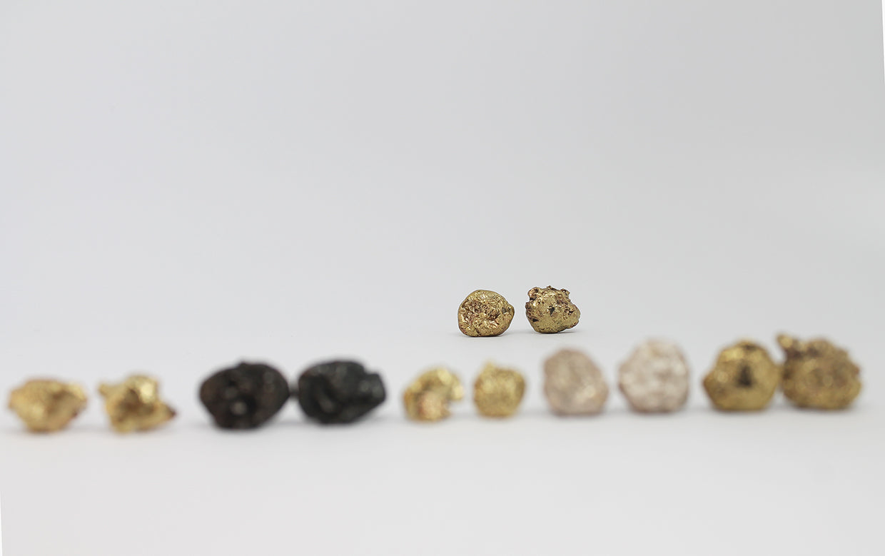 White silver mismatched earrings