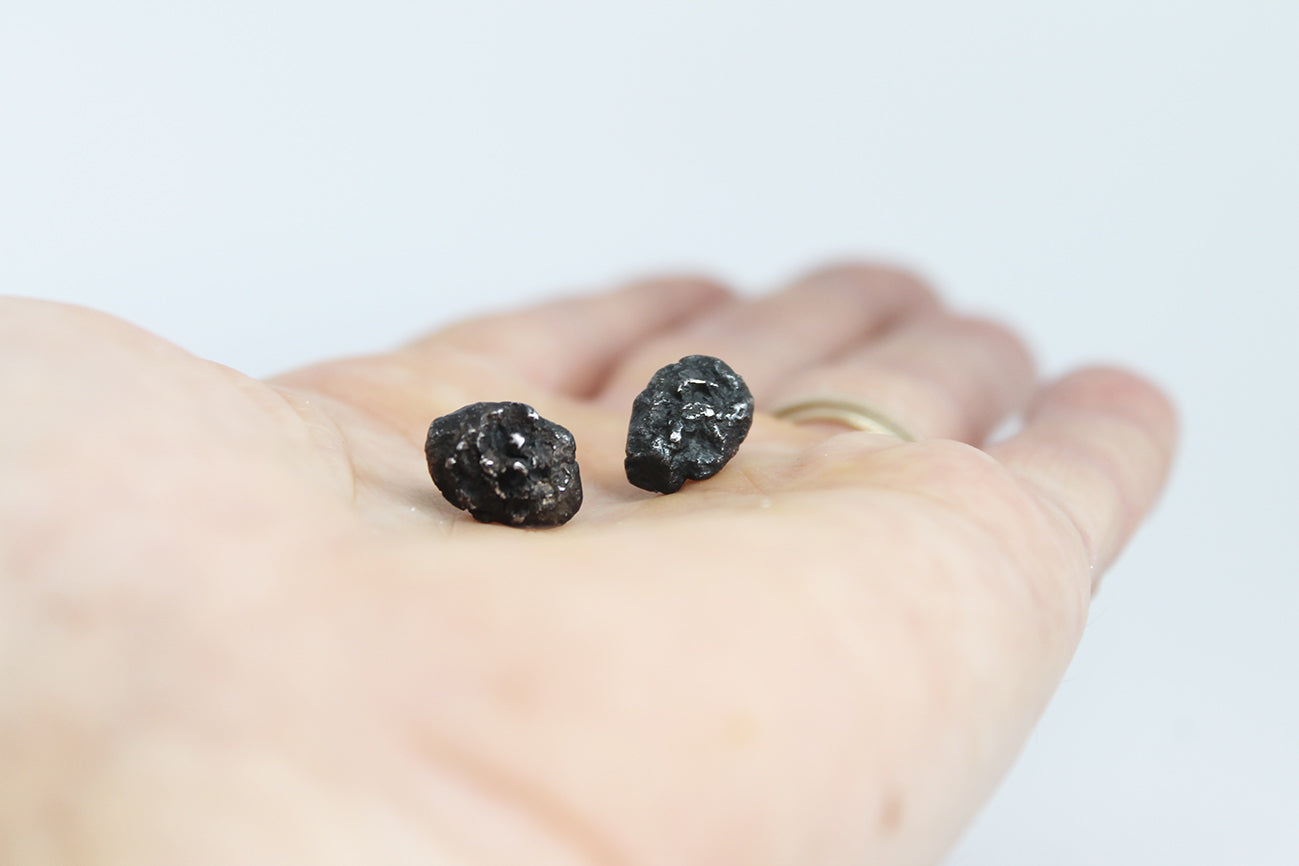 Black silver mismatched earrings