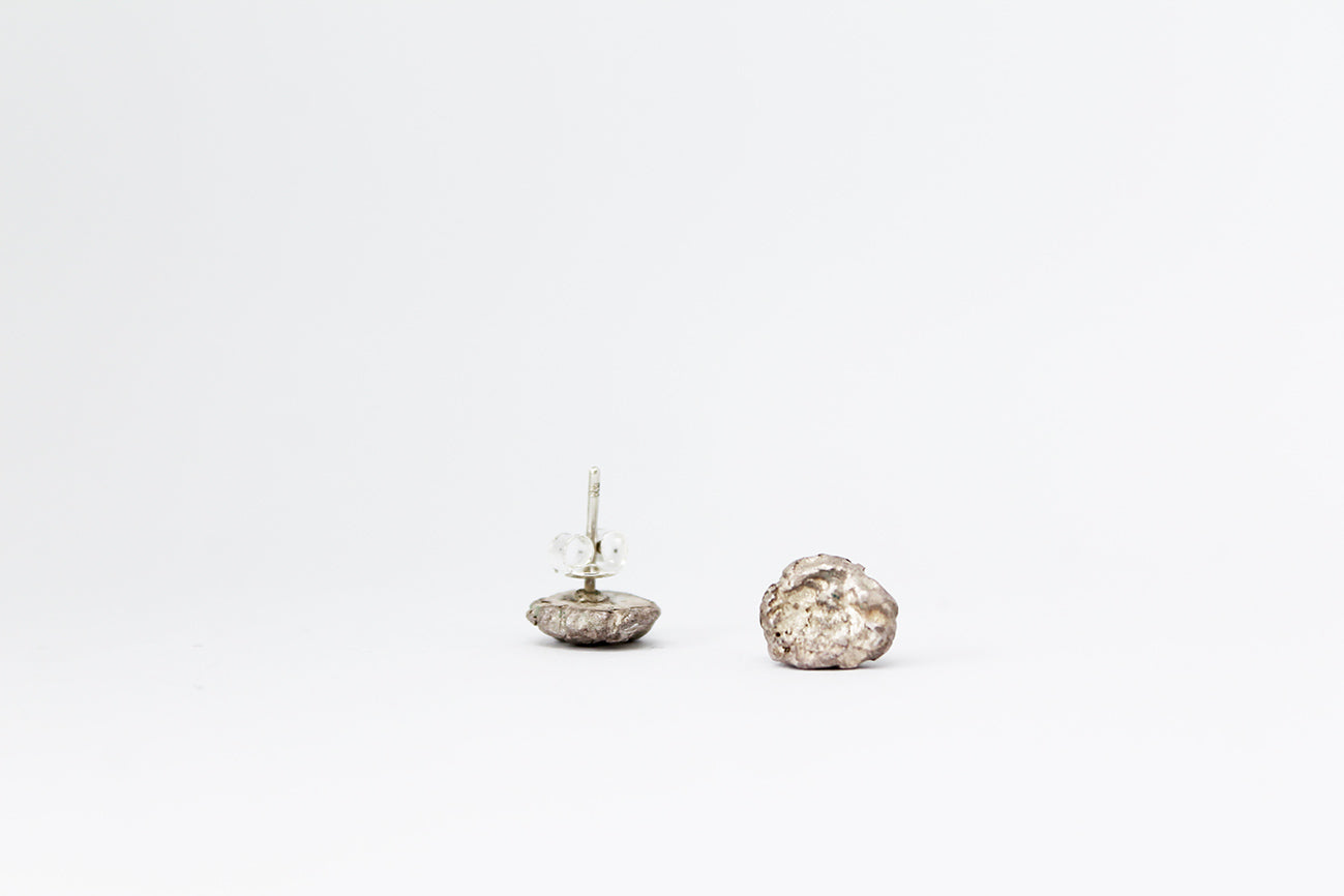 White silver mismatched earrings