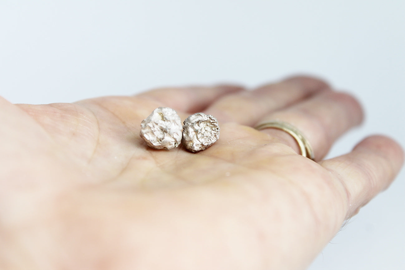 White silver mismatched earrings