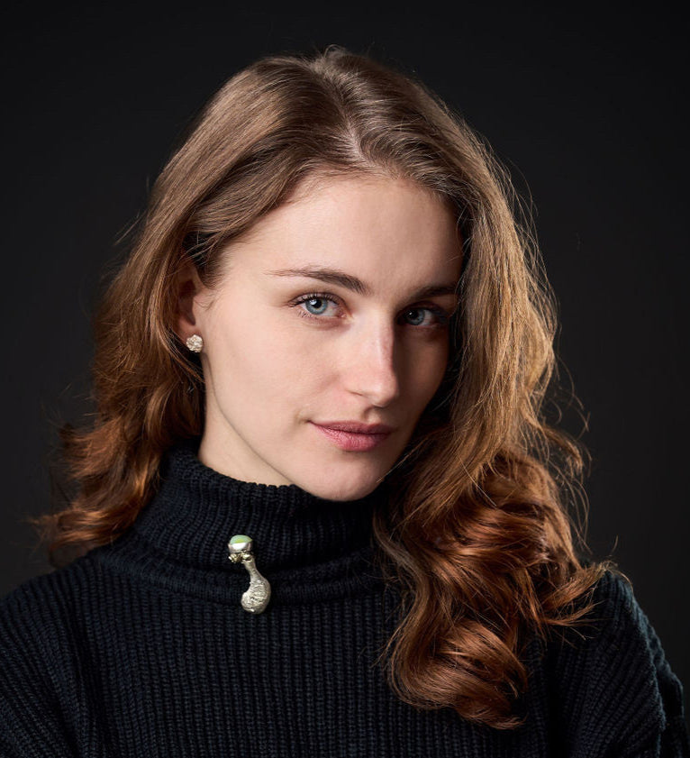 White silver mismatched earrings