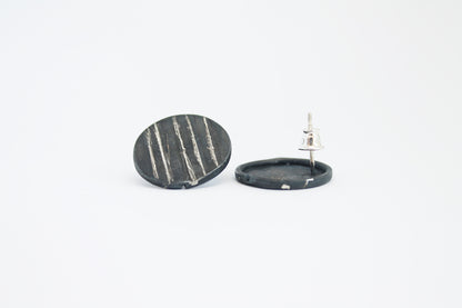 Round black silver stud earrings