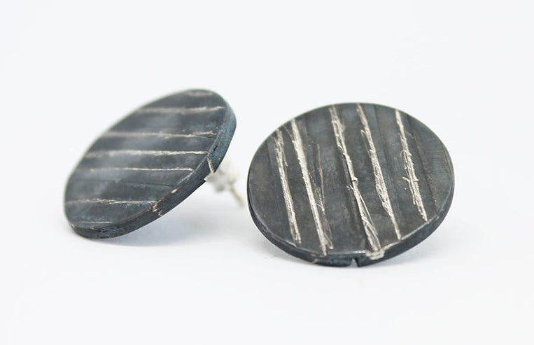 Round black silver stud earrings