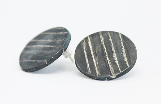 Round black silver stud earrings