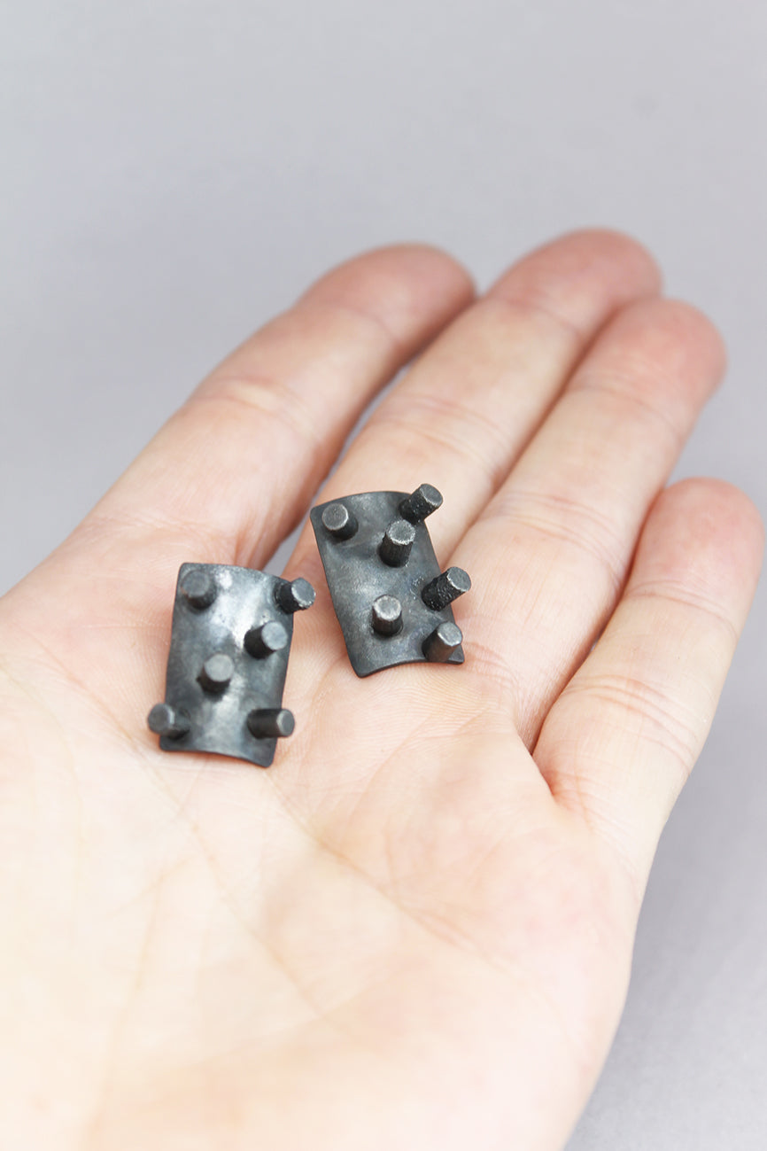 Black silver spikes earrings