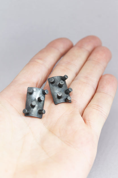 Black silver spikes earrings