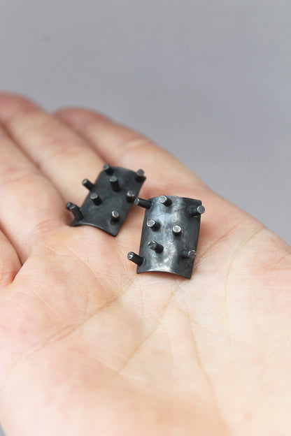 Black silver spikes earrings