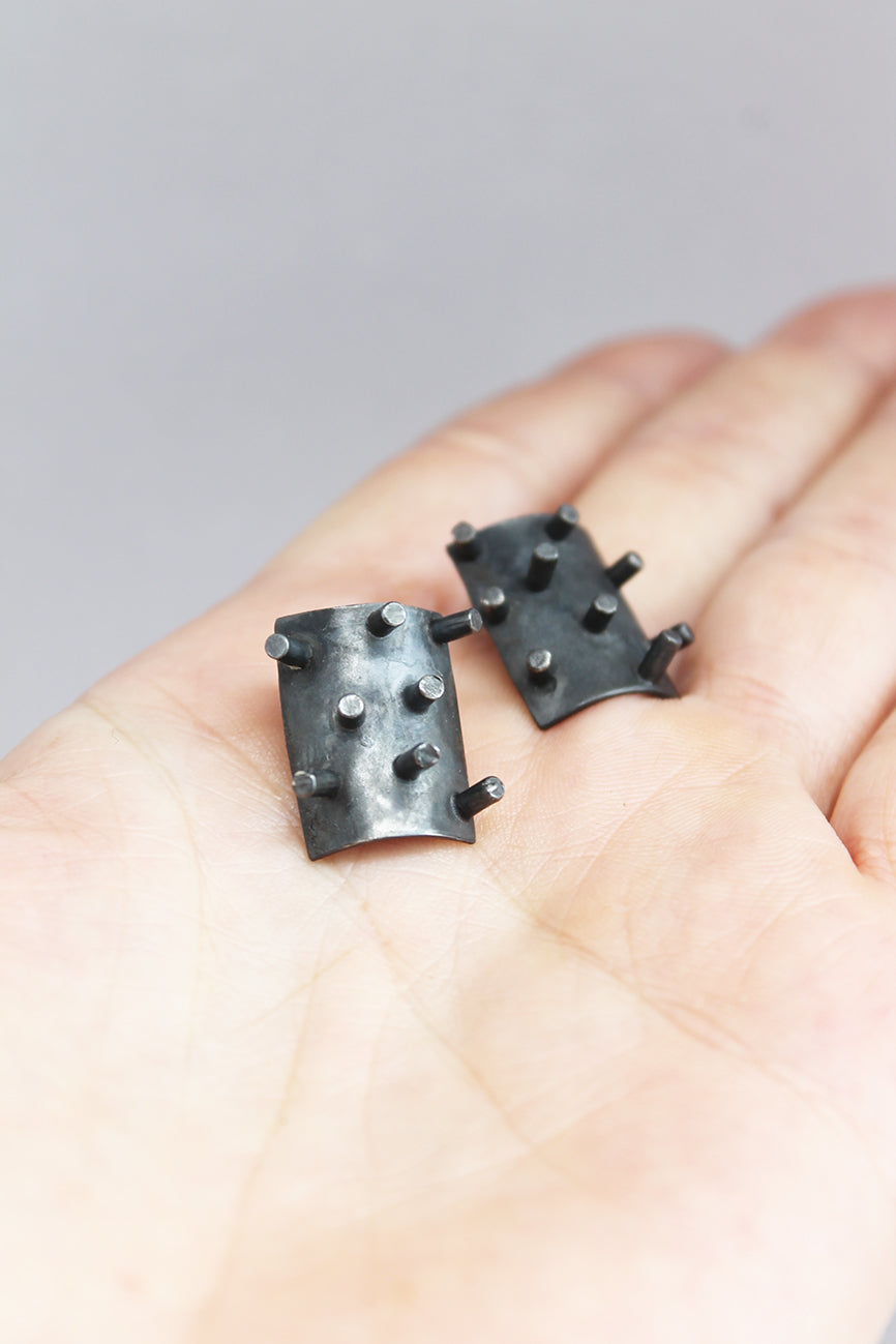 Black silver spikes earrings