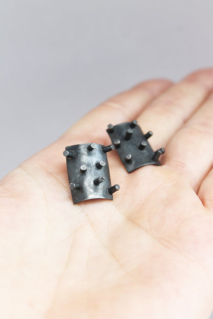Black silver spikes earrings