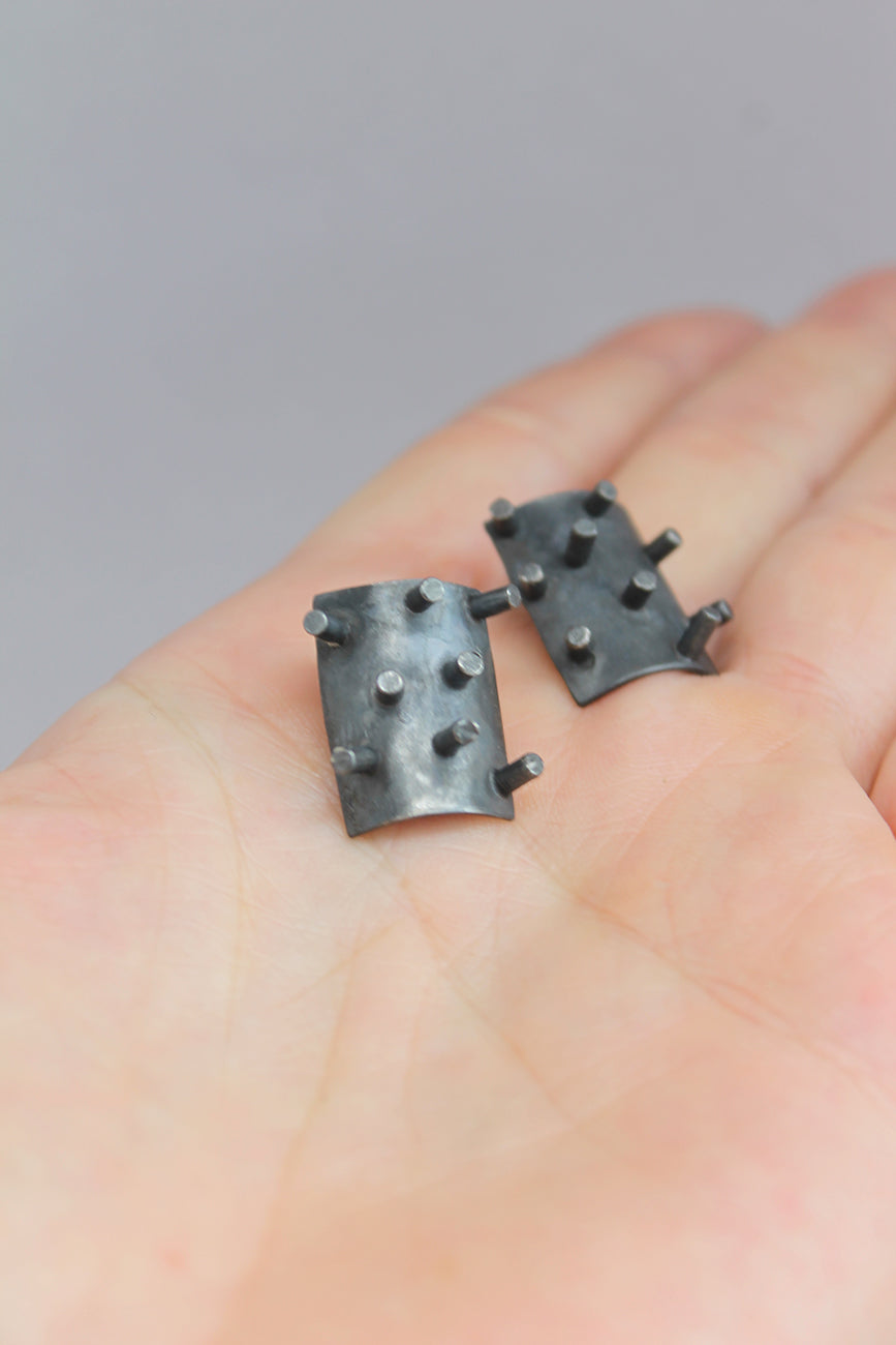 Black silver spikes earrings