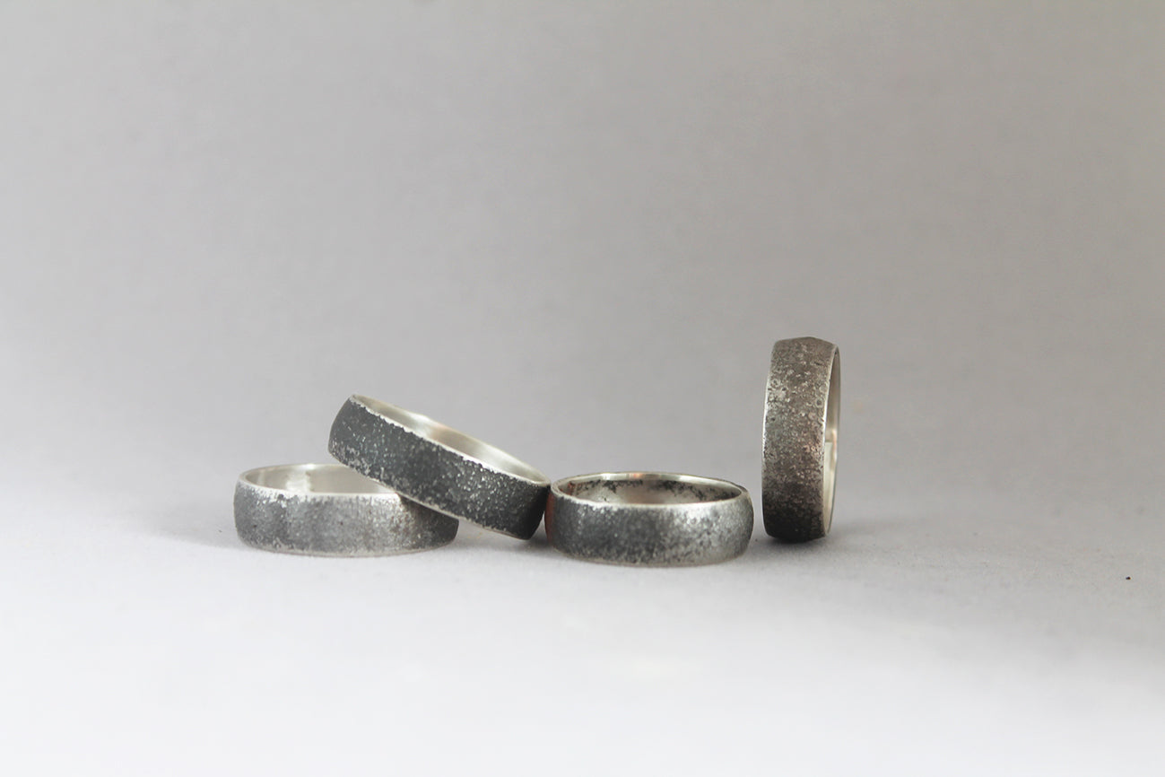 Unisex black silver ring