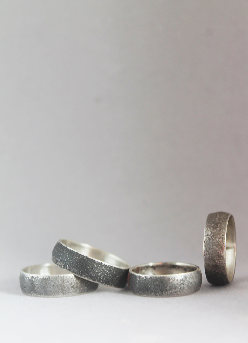 Unisex black silver ring