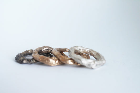 Unique artsy rings sandcasted in bronze