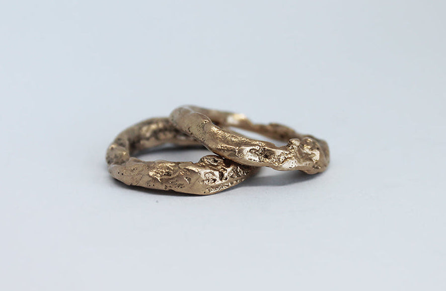 Unique artsy rings sandcasted in bronze