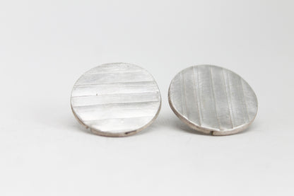 Round Silver Textured earrings