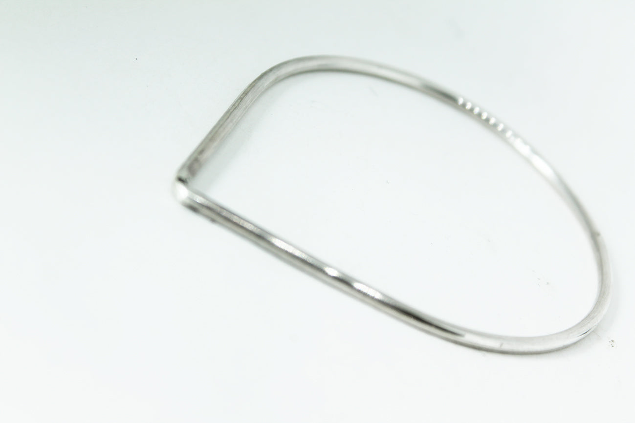 Mono silver teardrop bangle